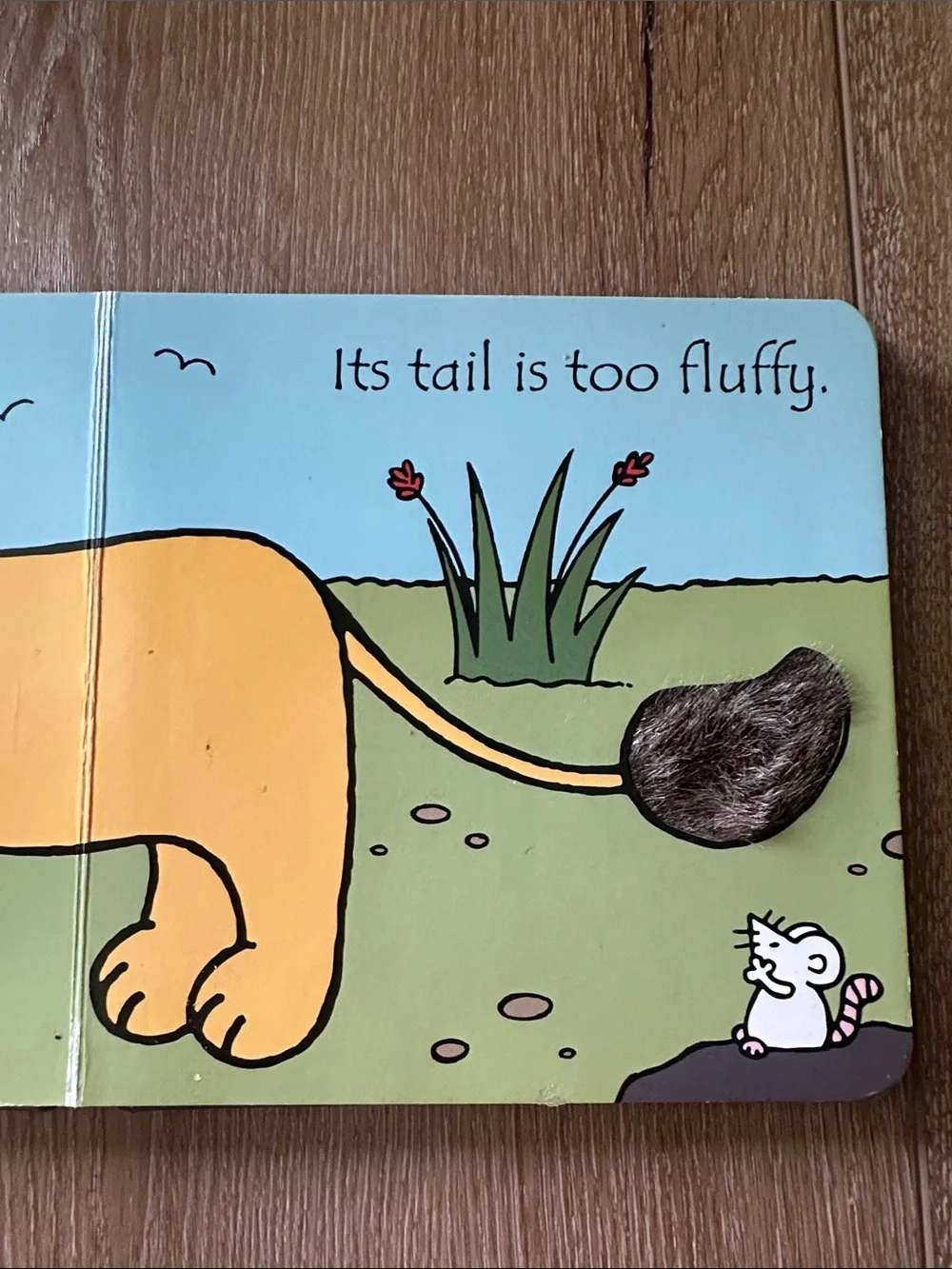 Usborne That's Not My Lion Touchy-Feely Board Book - Purple & Yellow